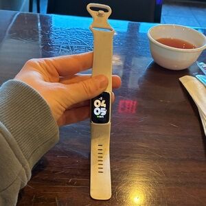 Fitbit Smartwatch with Cream Band